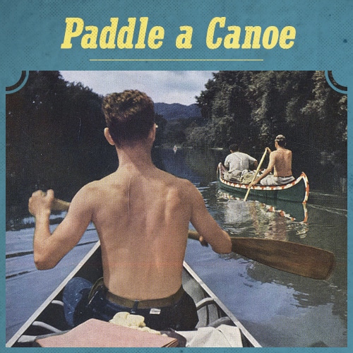Vintage men paddle a canoe in river.