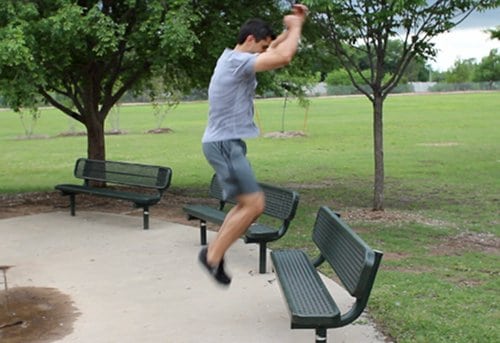 Vintage man jumping on the bench.