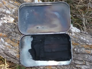 char Altoids tin using for charcloth maker.