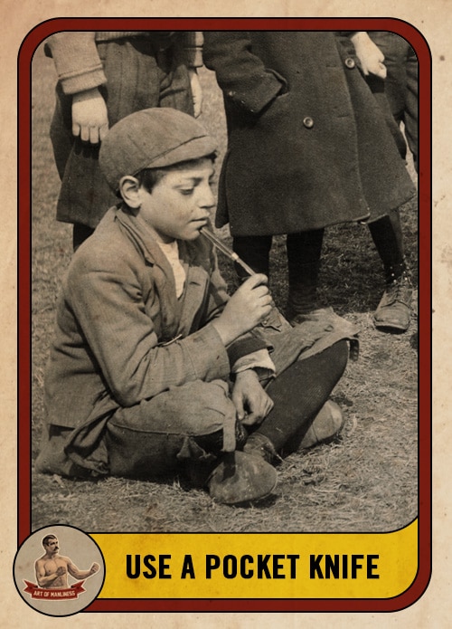 Vintage boy playing mumble peg with pocket knife.
