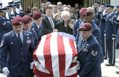 deadsoldier Soldiers carrying casket for funeral.