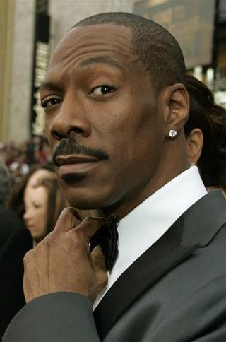 Eddie Murphy Eddie Murphy posing with mustache.