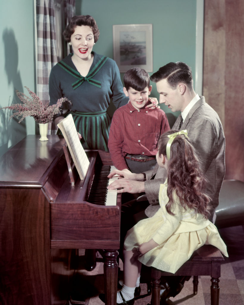 A family is singing Capella.