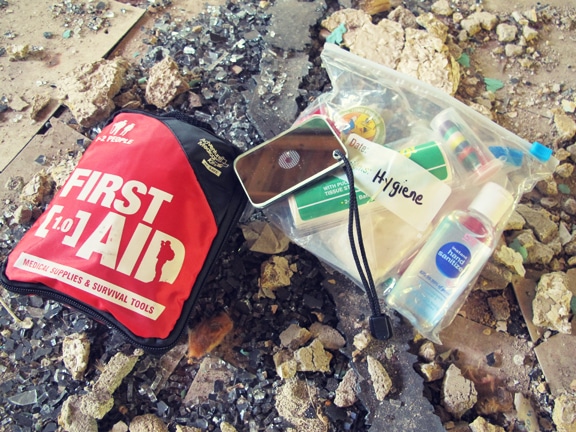 First aid kit and hygiene food placed at disaster house.