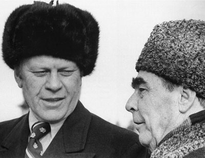 President Gerald Ford and Brezhnev in Ushanka trapper hats.
