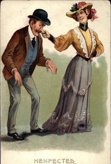 An old postcard capturing a moment of passionate affection between a man and woman.