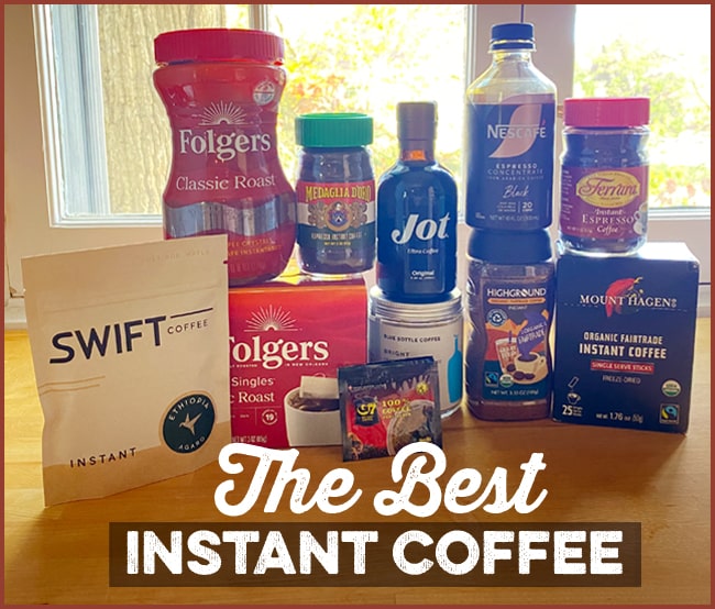 A variety of instant coffee brands and containers are displayed on a wooden table in front of a window, highlighting "The Best Instant Coffee" at the bottom.