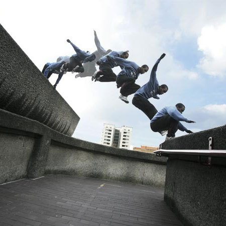 Men jumping from rooftops. 