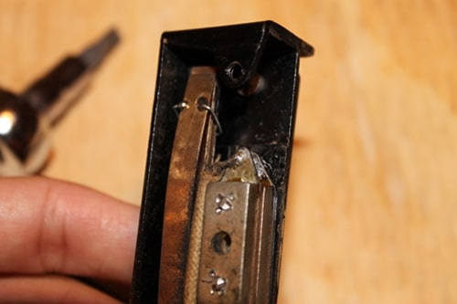 Vintage zoomed out picture of the ring soldered around the plates.