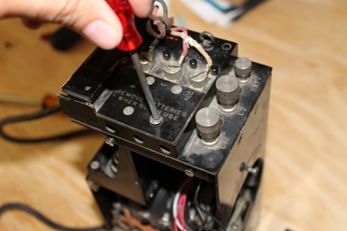 Vintage taking off the top plate unscrew that screw on the right.