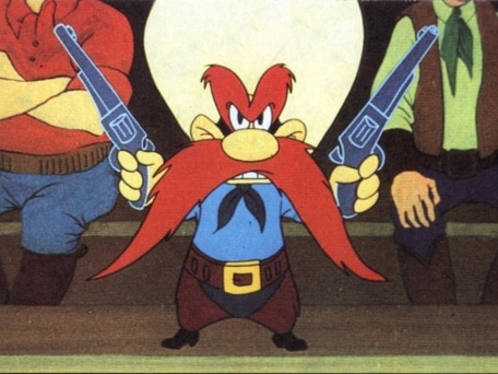 Yosemite Sam Yosemite Sam with long mustache holding guns.